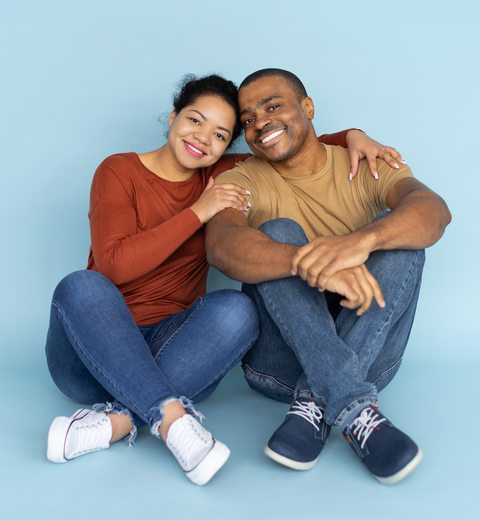 African American couple sitting — Marriage Bliss TT